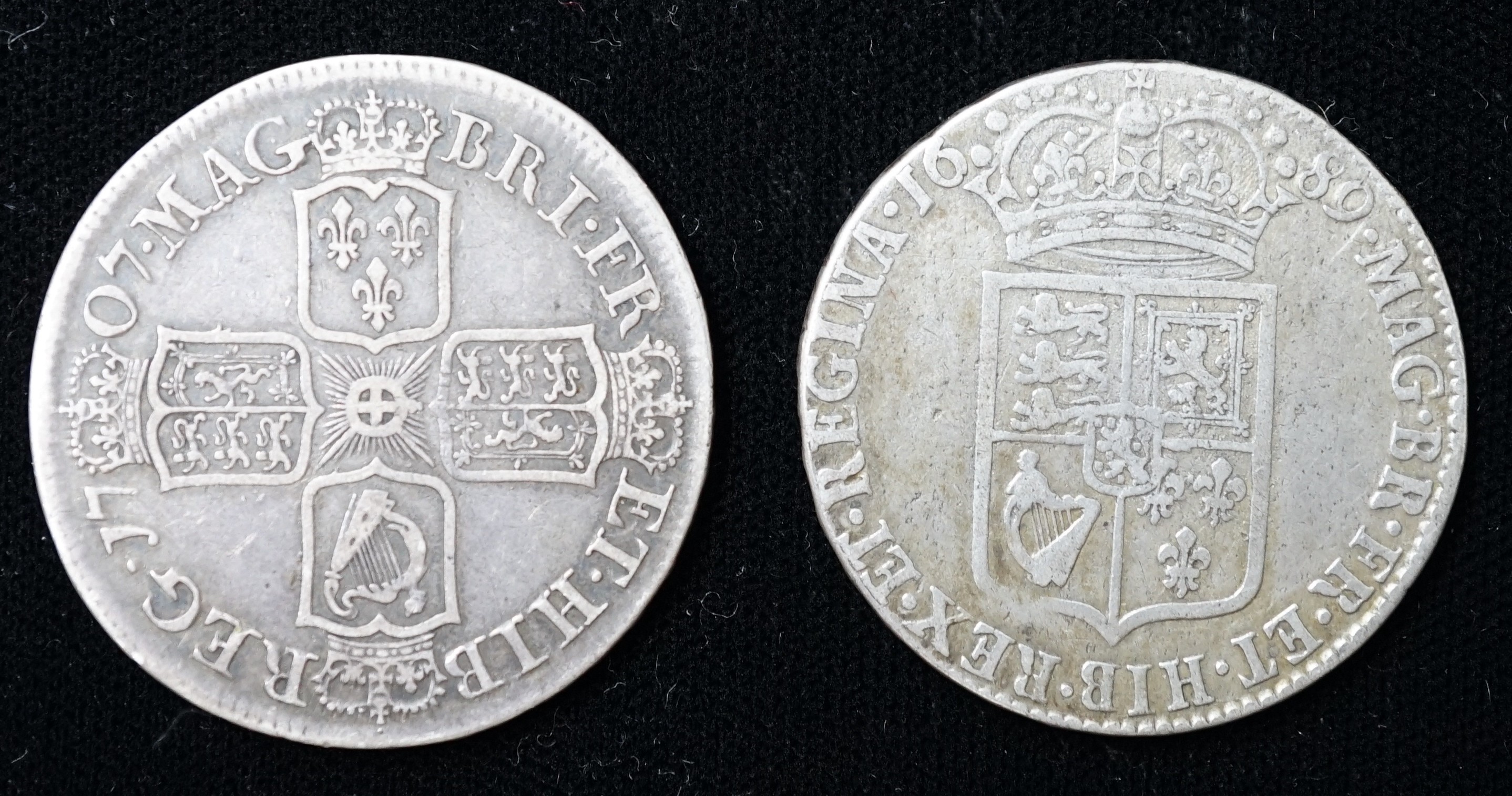 A Queen Anne silver halfcrown, 1707 E, SEXTO edge, about Fine and a William & Mary silver halfcrown 1689, about Fine or better